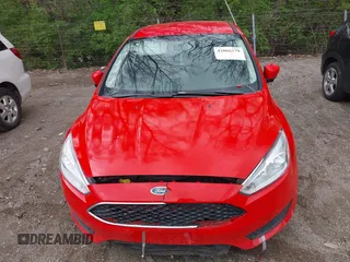 2016 Ford Focus SE z VIN 1FADP3F23GL285640, wystawiony jako IAAI lot #42066370 z przebiegiem 97 007 mil mil oraz . Historia ofert i sprzedaży dostępna na DreamBid. Obrazek 12.