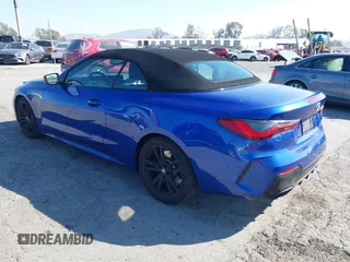 2024 BMW 4 Series M440i with VIN WBA53AT0XRCP24298, listed as a IAAI auction lot 41648187 with Not Provided miles and . Bid and sale history available at carsss.com. Image 3.