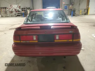 1995 Ford Escort z VIN 3FASP13J2SR157861, wystawiony jako Copart lot #82770964 z przebiegiem 48 610 mil mil oraz Szkoda całkowita • Salvage title. Historia ofert i sprzedaży dostępna na DreamBid. Obrazek 6.