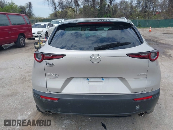 2022 Mazda CX-30 S Select z VIN 3MVDMBBL2NM439681, wystawiony jako IAAI lot #41960902 z przebiegiem 22 730 mil mil oraz . Historia ofert i sprzedaży dostępna na DreamBid. Obrazek 16.
