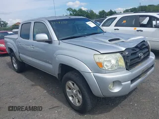 2006 Toyota Tacoma PreRunner z VIN 3TMJU62N76M008235, wystawiony jako IAAI lot #42785721 z przebiegiem 240 619 mil mil oraz . Historia ofert i sprzedaży dostępna na DreamBid. Obrazek 1.