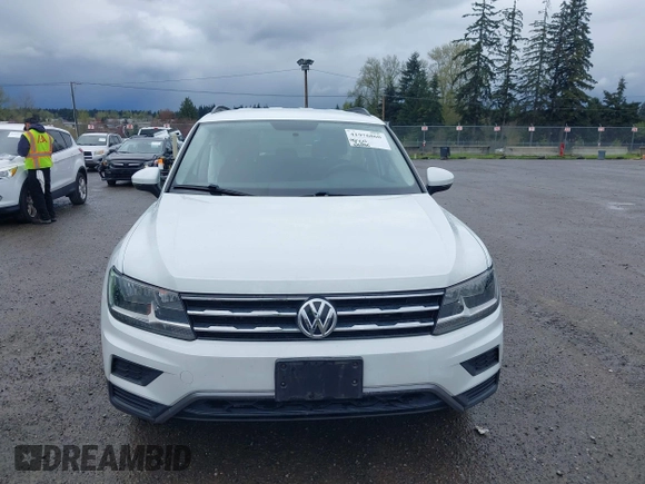 2018 Volkswagen Tiguan S с VIN 3VV0B7AXXJM051617, выставлен на аукционе IAAI как лот 41976860 с пробегом 66 186 миль миль и . История ставок и продаж доступна на DreamBid. Изображение 12.