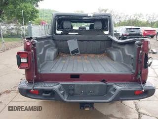 2021 Jeep Gladiator Overland z VIN 1C6HJTFGXML555622, wystawiony jako IAAI lot #42237686 z przebiegiem 62 358 mil mil oraz . Historia ofert i sprzedaży dostępna na DreamBid. Obrazek 16.