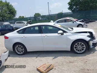 2020 Ford Fusion SE with VIN 3FA6P0LUXLR155881, listed as a IAAI auction lot 42426199 with 103,809 mi miles and . Bid and sale history available at DreamBid. Image 14.