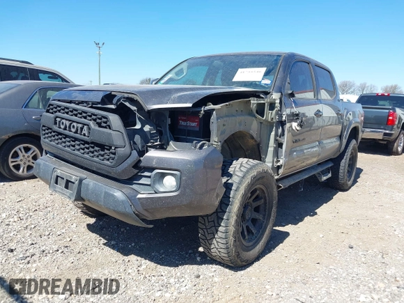 2017 Toyota Tacoma SR5 with VIN 5TFCZ5AN0HX073818, listed as a IAAI auction lot 41755546 with 129,861 mi miles and . Bid and sale history available at DreamBid. Image 18.