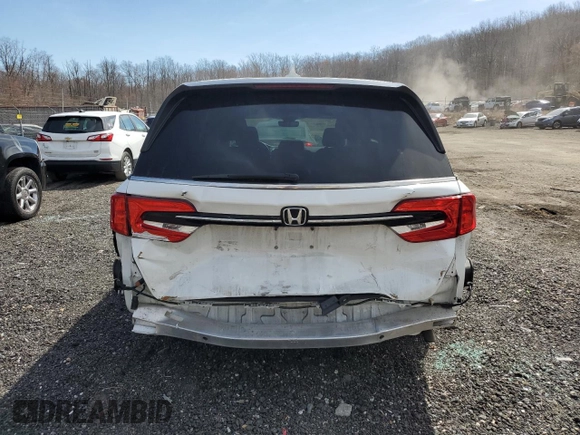 2021 Honda Odyssey Touring with VIN 5FNRL6H85MB008260, listed as a Copart auction lot 49244845 with 58,570 mi miles and Salvage Title. Bid and sale history available at carsss.com. Image 6.