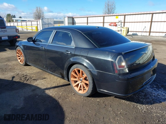 2006 Chrysler 300 C SRT8 with VIN 2C3LA73W06H370568, listed as a IAAI auction lot 41982346 with 133,209 mi miles. Bid and sale history available at carsss.com. Image 3.