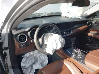 2018 Alfa Romeo Stelvio z VIN ZASFAKAN1J7B89142, wystawiony jako IAAI lot #42192248 z przebiegiem Nie podano mil oraz . Historia ofert i sprzedaży dostępna na DreamBid. Obrazek 20.