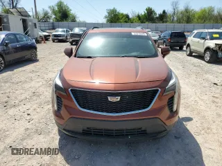 2019 Cadillac XT4 AWD Sport with VIN 1GYFZFR42KF136567, listed as a Copart auction lot 52018445 with 99,944 mi miles and Salvage title. Bid and sale history available at DreamBid. Image 5.