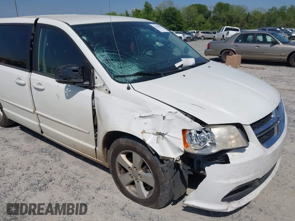 2013 Dodge Grand Caravan SE with VIN 2C4RDGBG9DR516044, listed as a IAAI auction lot 41998893 with 214,645 mi miles and . Bid and sale history available at DreamBid. Image 6.