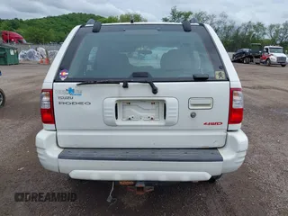 2000 Isuzu Rodeo z VIN 4S2DM58W6Y4312571, wystawiony jako IAAI lot #42253955 z przebiegiem 84 517 mil mil oraz . Historia ofert i sprzedaży dostępna na DreamBid. Obrazek 16.