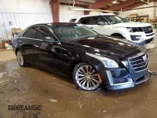 2015 Cadillac CTS Luxury AWD with VIN 1G6AX5SX8F0107476, listed as a Copart auction lot 47990175 with 144,934 mi miles and Clean title. Bid and sale history available at DreamBid. Image 4.