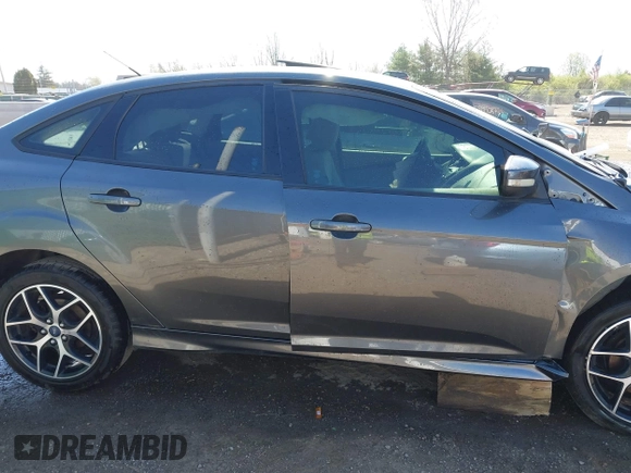 2015 Ford Focus SE with VIN 1FADP3F29FL268677, listed as a IAAI auction lot 42037244 with 118,018 mi miles. Bid and sale history available at carsss.com. Image 14.