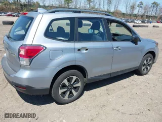 2017 Subaru Forester with VIN JF2SJABC1HH577623, listed as a IAAI auction lot 42061596 with 67,900 mi miles. Bid and sale history available at carsss.com. Image 4.