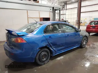 2009 Mitsubishi Lancer ES with VIN JA3AU26U29U036243, listed as a IAAI auction lot 41952044 with 181,650 mi miles. Bid and sale history available at carsss.com. Image 4.