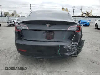 2022 Tesla Model 3 with VIN 5YJ3E1EA3NF190102, listed as a Copart auction lot 50657535 with 73,015 mi miles and Salvage Title. Bid and sale history available at DreamBid. Image 6.