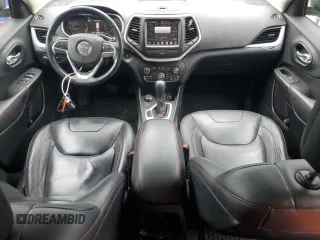 2015 Jeep Cherokee Trailhawk z VIN 1C4PJMBSXFW588030, wystawiony jako Copart lot #55057635 z przebiegiem 116 209 mil mil oraz Szkoda całkowita • Salvage title. Historia ofert i sprzedaży dostępna na DreamBid. Obrazek 8.