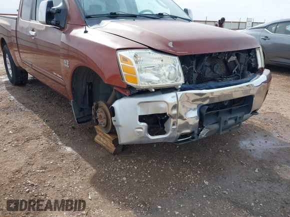 2004 Nissan Titan XE with VIN 1N6AA06A04N508069, listed as a IAAI auction lot 41571931 with 180,119 mi miles. Bid and sale history available at carsss.com. Image 6.