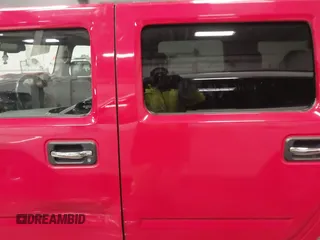2004 Hummer H2 with VIN 5GRGN23U24H114730, listed as a IAAI auction lot 41605451 with 122,658 mi miles. Bid and sale history available at carsss.com. Image 14.