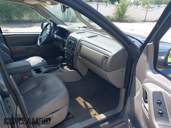 2002 Jeep Grand Cherokee Laredo with VIN 1J4GW48SX2C206755, listed as a IAAI auction lot 42631502 with 155,752 mi miles and . Bid and sale history available at DreamBid. Image 5.