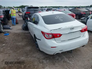 2015 Infiniti Q50 Premium z VIN JN1BV7APXFM352327, wystawiony jako IAAI lot #42367983 z przebiegiem 110 636 mil mil oraz . Historia ofert i sprzedaży dostępna na DreamBid. Obrazek 3.