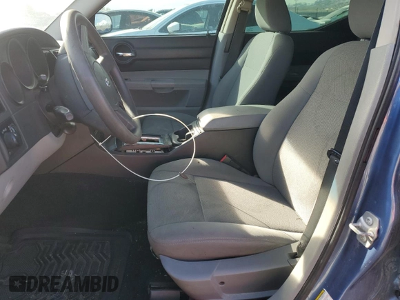 2007 Dodge Charger with VIN 2B3KA43R87H676386, listed as a Copart auction lot 46897315 with 128,922 mi miles and Clean Title. Bid and sale history available at DreamBid. Image 7.