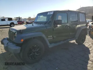 2007 Jeep Wrangler Unlimited X with VIN 1J8GB39117L161786, listed as a Copart auction lot 79554374 with 304,969 mi miles and Salvage Title. Bid and sale history available at DreamBid. Image 1.