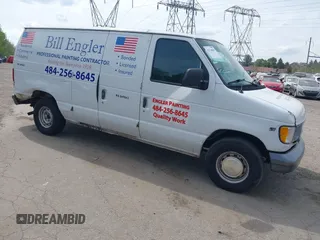 2000 Ford Econoline Cargo with VIN 1FTRE14W1YHB19251, listed as a IAAI auction lot 42114841 with 164,139 mi miles. Bid and sale history available at carsss.com. Image 1.