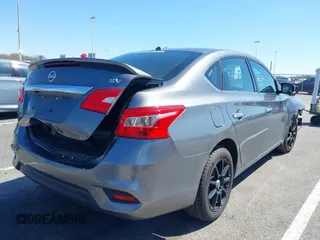 2018 Nissan Sentra SV with VIN 3N1AB7AP3JL633148, listed as a IAAI auction lot 41983588 with 148,479 mi miles and . Bid and sale history available at DreamBid. Image 4.