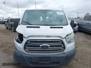 2016 Ford Transit Cargo Van with VIN 1FTYR1ZM5GKA58477, listed as a IAAI auction lot 41829410 with 186,669 mi miles. Bid and sale history available at carsss.com. Image 12.