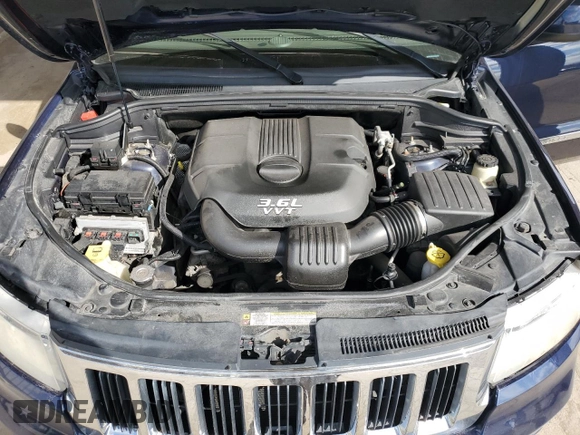 2012 Jeep Grand Cherokee Laredo with VIN 1C4RJFAG8CC288629, listed as a Copart auction lot 50487555 with 182,972 mi miles and Clean Title. Bid and sale history available at carsss.com. Image 12.