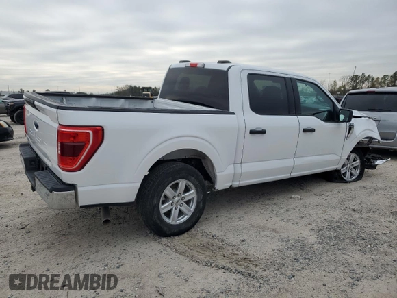 2022 Ford F-150 XL with VIN 1FTFW1E53NKD58742, listed as a Copart auction lot 88101975 with 32,303 mi miles and Salvage Title. Bid and sale history available at carsss.com. Image 3.
