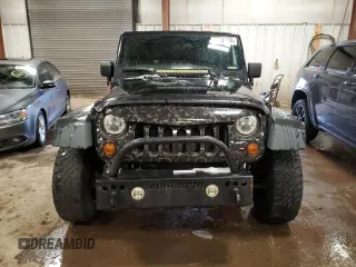 2010 Jeep Wrangler Rubicon with VIN 1J4BA6D10AL106213, listed as a Copart auction lot 86306184 with 180,825 mi miles and Clean title. Bid and sale history available at DreamBid. Image 5.