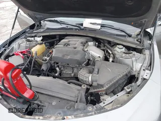 2020 Chevrolet Camaro 1LT z VIN 1G1FB1RX9L0128079, wystawiony jako IAAI lot #41173693 z przebiegiem 88 846 mil mil oraz . Historia ofert i sprzedaży dostępna na DreamBid. Obrazek 10.