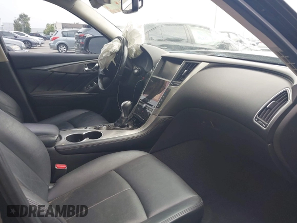 2015 Infiniti Q50 Premium z VIN JN1BV7AP5FM346323, wystawiony jako IAAI lot #41305093 z przebiegiem 112 556 mil mil oraz . Historia ofert i sprzedaży dostępna na DreamBid. Obrazek 5.