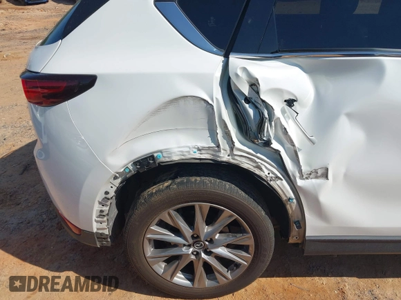 2021 Mazda CX-5 Grand Touring with VIN JM3KFBDM3M0493752, listed as a IAAI auction lot 42456854 with 35,122 mi miles and . Bid and sale history available at DreamBid. Image 18.