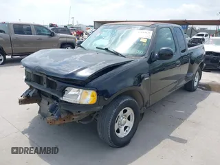 2002 Ford F-150 XL z VIN 1FTRX07W12KD47521, wystawiony jako IAAI lot #42044623 z przebiegiem 334 930 mil mil oraz . Historia ofert i sprzedaży dostępna na DreamBid. Obrazek 2.