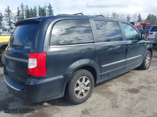 2012 Chrysler Town & Country Touring with VIN 2C4RC1BG0CR229397, listed as a IAAI auction lot 41820467 with 211,420 mi miles. Bid and sale history available at carsss.com. Image 4.