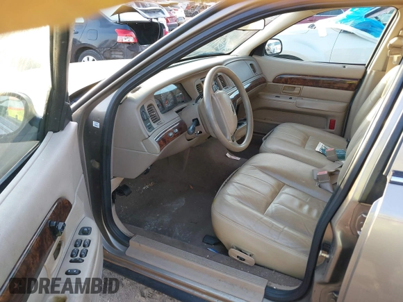 2004 Mercury Grand Marquis GS with VIN 2MEFM74WX4X696703, listed as a IAAI auction lot 42171970 with 149,556 mi miles and . Bid and sale history available at DreamBid. Image 5.