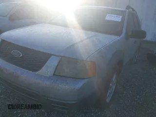 2005 Ford Freestyle SE with VIN 1FMZK01165GA52333, listed as a IAAI auction lot 41062704 with 234,459 mi miles. Bid and sale history available at carsss.com. Image 6.