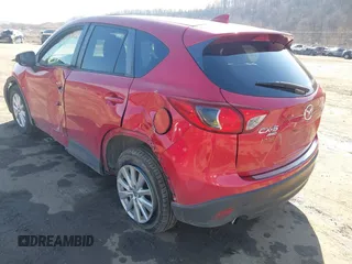 2016 Mazda CX-5 Touring with VIN JM3KE4CY4G0860035, listed as a IAAI auction lot 41678299 with 72,101 mi miles. Bid and sale history available at carsss.com. Image 3.