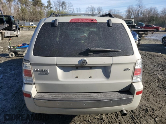 2009 Mercury Mariner Premier z VIN 4M2CU97G89KJ20990, wystawiony jako Copart lot #42984005 z przebiegiem Nie podano mil oraz Szkoda całkowita • Salvage title. Historia ofert i sprzedaży dostępna na DreamBid. Obrazek 6.
