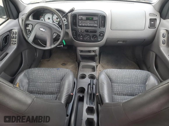 2001 Ford Escape XLS with VIN 1FMYU02161KB01283, listed as a Copart auction lot 59145105 with 86,195 mi miles and Salvage title. Bid and sale history available at DreamBid. Image 8.