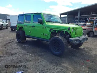 2019 Jeep Wrangler Unlimited Sport S z VIN 1C4HJXDG2KW579332, wystawiony jako IAAI lot #41265087 z przebiegiem 85 625 mil mil oraz . Historia ofert i sprzedaży dostępna na DreamBid. Obrazek 1.