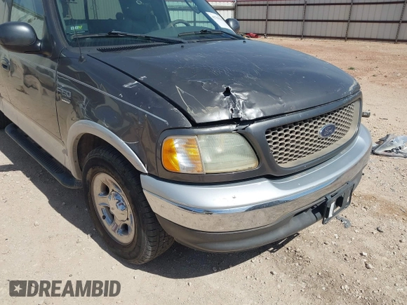 2002 Ford F-150 XL with VIN 1FTRX07L92KC81256, listed as a IAAI auction lot 41765831 with 149,506 mi miles. Bid and sale history available at carsss.com. Image 6.
