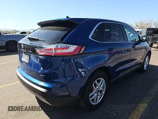 2022 Ford Edge SEL z VIN 2FMPK4J92NBA72221, wystawiony jako IAAI lot #42189231 z przebiegiem 59 668 mil mil oraz . Historia ofert i sprzedaży dostępna na DreamBid. Obrazek 1.