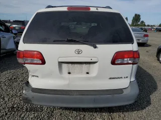 2001 Toyota Sienna LE with VIN 4T3ZF13C61U362980, listed as a Copart auction lot 71986484 with 188,556 mi miles and Salvage Title. Bid and sale history available at carsss.com. Image 6.