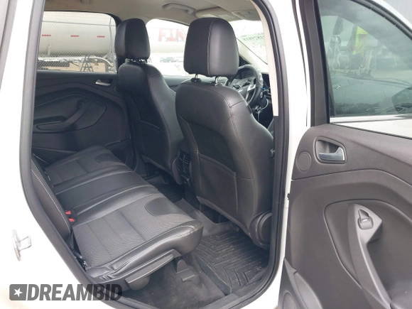 2016 Ford Escape SE with VIN 1FMCU0GX0GUA95789, listed as a IAAI auction lot 41829818 with 84,431 mi miles. Bid and sale history available at carsss.com. Image 8.