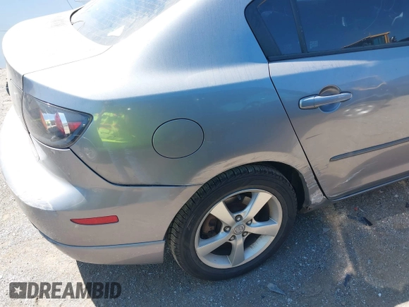 2006 Mazda 3 s Grand Touring with VIN JM1BK323261410457, listed as a IAAI auction lot 42057678 with 203,872 mi miles. Bid and sale history available at carsss.com. Image 12.