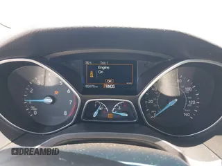 2016 Ford Focus SE z VIN 1FADP3F25GL329217, wystawiony jako IAAI lot #42461772 z przebiegiem 85 070 mil mil oraz . Historia ofert i sprzedaży dostępna na DreamBid. Obrazek 7.